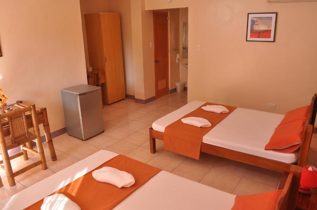 Slam'S Garden Dive Resort Logon Room photo