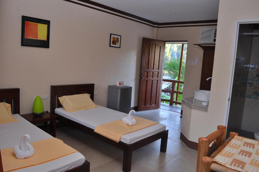 Slam'S Garden Dive Resort Logon Room photo
